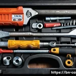 자동차정비기사 실기시험 도구 준비물 - A detailed close-up of a high-quality car mechanic's toolset laid out neatly on a wooden workbench, ...